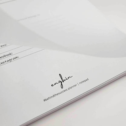 Close-up of undated productivity life planner pages with sections for address, Facebook, and Instagram.