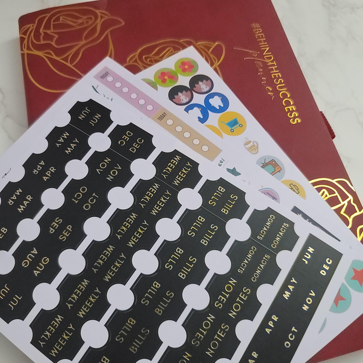 Undated productivity life planner with monthly, weekly, and decorative planner stickers