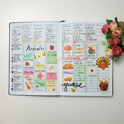 Decorated November planner spread with colorful autumn stickers, handwritten notes, and flowers
