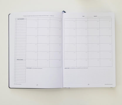 Open undated productivity planner showing monthly calendar, special events, and notes sections.